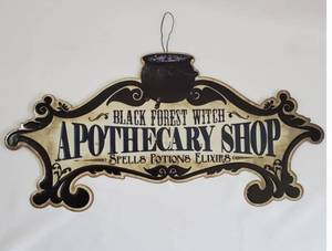 lot 52940 image: (Lot of 2) Black Forest Witch Apothecary Shop Spells Potions Elixirs Metal Halloween Sign