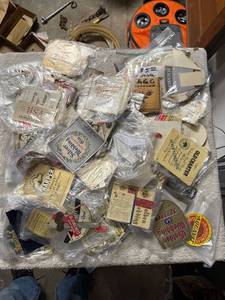 lot 6685 image: tub of liquor bottle labels