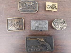 lot 5549 image: 6 belt buckles - Wichester, Colt, SmithWesson, Frontier