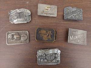 lot 5552 image: 7 belt buckles- tool related