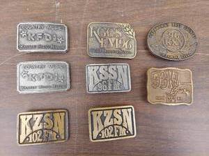 lot 5567 image: 8 belt buckles -radio stations