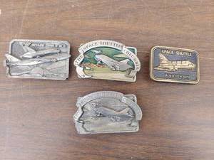 lot 5592 image: 4 belt buckles - space shuttle
