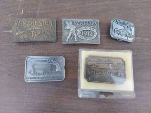 lot 5676 image: belt buckles - guns