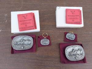 lot 5684 image: Buffalo Hunt by CM Russell Belt Buckles and Keychain
