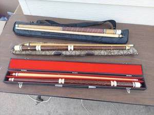 lot 5686 image: 3 pool sticks with cases