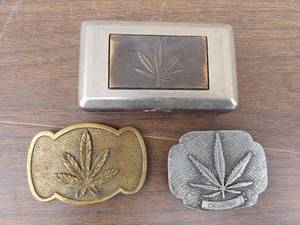 lot 5742 image: belt buckles and case