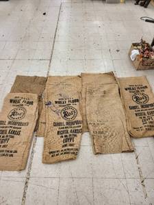 lot 4560 image: l9t of 7 old flour sacks