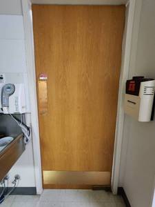 lot 37454 image: Wood Swinging Door with Kick Plate