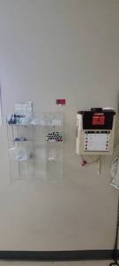 lot 37479 image: Syringe Caddy W Contents and a Biohazard Waste Container