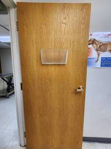lot 37448 image: Wood Door With Gold Lever