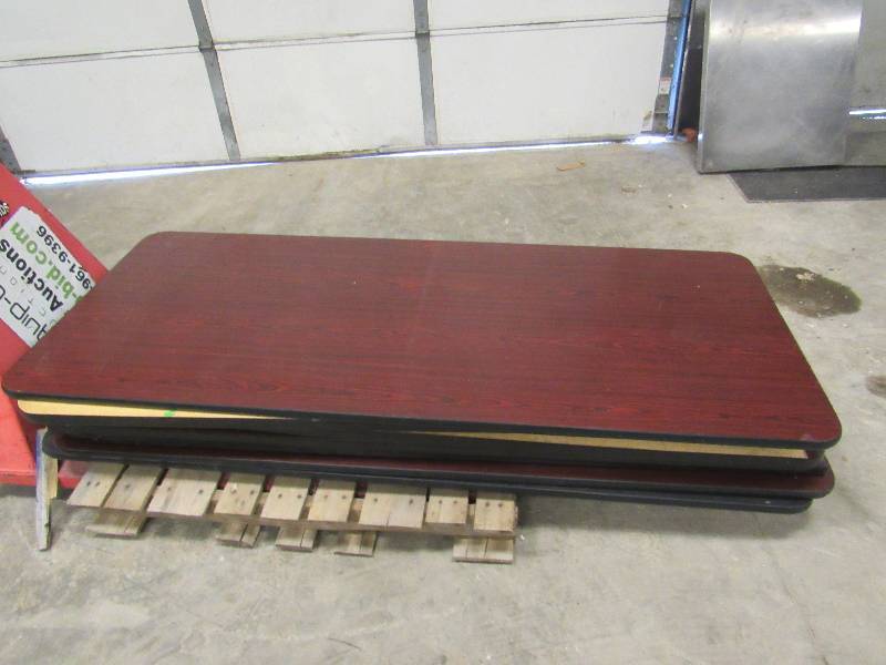 lot 779 image: Lot of (9) 72x30  Dark Cherry Wood Finished Laminate Top Table Tops With Black Trimming