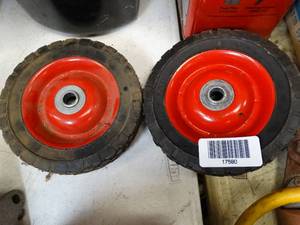 lot 17580 image: 2 Small Mower Wheels