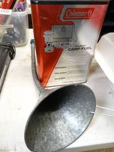 lot 17668 image: Long Metal Funnel and Partial Can of Coleman Fuel