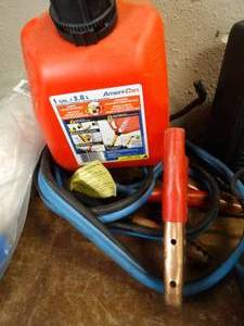 lot 17833 image: One gallon Plastic gas Can and Jumper cables