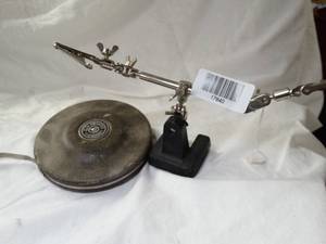 lot 17840 image: Small Adjustable holder and 50Ft Tape measurer