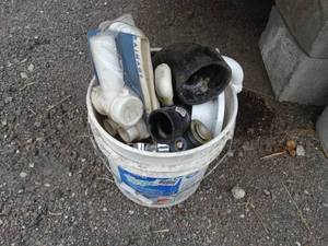 lot 1165 image: Bucket of Misc Plumbing Parts
