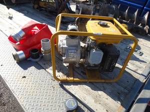 lot 1962 image: Portable Water Pump and Hose