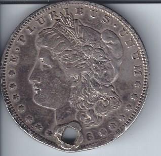 lot 1949 image: Morgan Dollar with a hole through the year