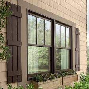 lot 7927 image: 16.25 in. x 63 in. Polypropylene Plastic 4-Board Open Board and Batten Shutters Pair in Terra Brown