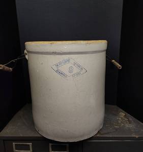 lot 210 image: #8 Pittsburg Pottery Diamond Brand Crock with WireWood Handles