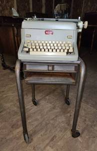 lot 252 image: Vintage Royal Manual Typewriter (keys work) and Table