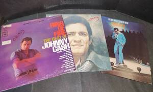lot 279 image: (2) Johnny Cash Records and a Conway Twitty Record