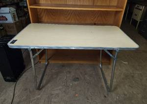 lot 309 image: Folding Table 48x24x30 (See pics for damage)