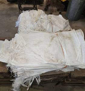 lot 468 image: (2) Bundles of Feed SacksNut Bags with Drawstring Ties 14x26