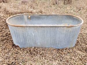 lot 513 image: Galvanized Stock Tank (see pics for small holes) 59x23x24