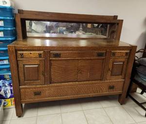 lot 5 image: Antique Solid Oak Buffet in Excellent Condition (Located in Basement) 66.5x24x57.5 (This is EXTREMELY HEAVY, bring your own loading help)