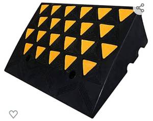 lot 200345 image: Retails for 99.50 BESEA Rubber Curb Ramp 6 inch High 23.6
