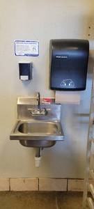 lot 18004 image: Single-Well Stainless Steel Sink W a Prim Source Towel Dispenser and a Soap Dispenser