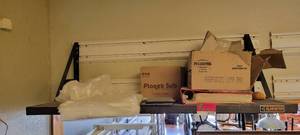 lot 18026 image: 45in Black Gladiator Wall-Mount Metal Shelf