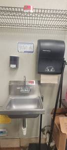 lot 18110 image: Win-Holt Stainless Steel Single Well Handwashing Sink W a Prime Source Paper Towel Dispenser and a Soap Dispenser