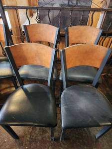 lot 18175 image: Lot of 4 Black Metal Dining Chairs with Wood Back and Cushioned Seat