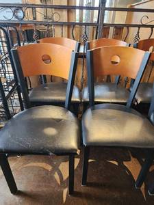 lot 18179 image: Lot of 4 Black Metal Dining Chairs with Wood Back and Cushioned Seat