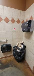 lot 18249 image: Black Trash Bin, Monogram Toilet Paper Dispenser, and a Motion Activated Marathon Towel Dispenser