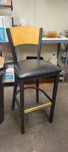 lot 18187 image: Lot of 2 Black Metal Barstools with Wooden Back and Cushioned Seat