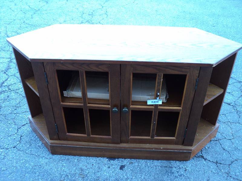 lot 4025 image: Entertainment Cabinet 42 x 22 x 24 tall, glass included but not installed