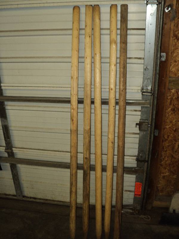 lot 4057 image: (5) Large wooden Garden Posts, approx 2 diameter x 6 tall, pointed ends