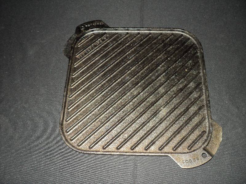 lot 4074 image: Lodge Cast iron griddle grill pan, double sided, 10-12 square