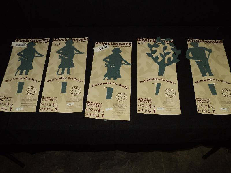 lot 4093 image: (5) ct. lot whats growing garden stake seed packet holders, female and male gardeners and plant