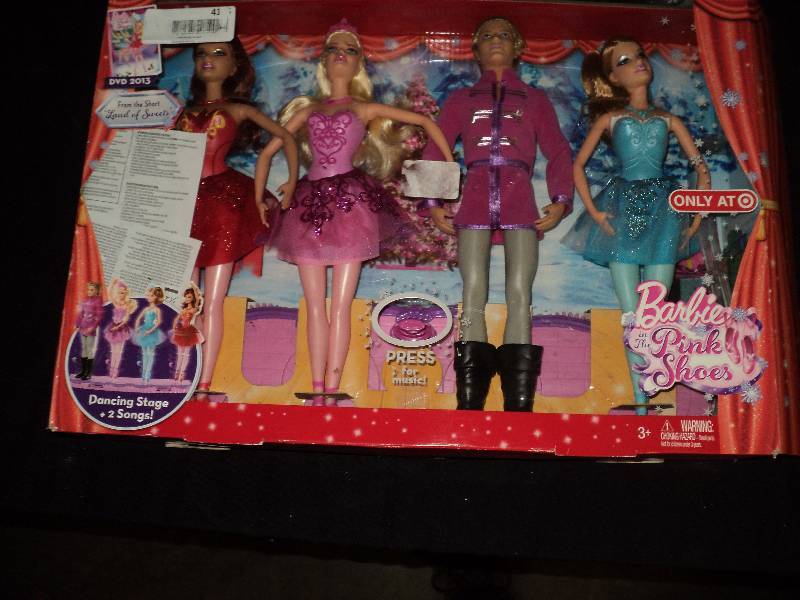 lot 4115 image: Barbie and the Pink Shoes Dancing Stage with 4 dolls, takes LR44 button batteries, not included