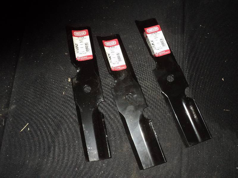 lot 4153 image: (3) ct. lot of new Oregon Mower Blades 91-636, 12., .630 center hole , replaces scag 482959