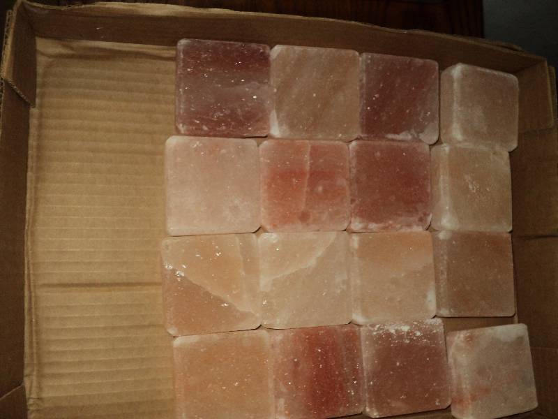 lot 4184 image: (16) ct. lot Pink salt blocks, blocs are 3 x 3 square w beveled edge, blocks may have chips, cracks, imperfections and may vary in shade from pcture.