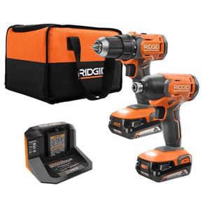 lot 69797 image: RIDGID 18V Cordless 2-Tool Combo Kit with 12 in. DrillDriver, 14 in. Impact Driver, (2) 2.0 Ah Batteries, Charger, and Bag