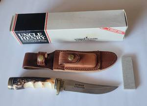lot 1200 image: Schrade Uncle Henry Golden Spike Rat Tail Tang Fixed Blade 153UH