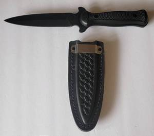 lot 1208 image: Very Rare Western Knife 777 Stamped Boot Knife with Black Handle and Sheath