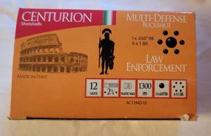 lot 2068 image: Centuries Multi - Defense Ammo 12 Gauge 2 34, .650 Diameter Round Ball Over #1 Buck 6 Pellets, Box of 10