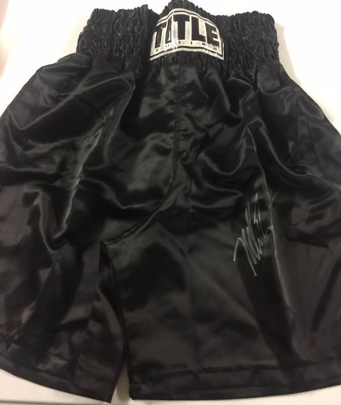 lot 1002 image: Signed Full Sized Mike Tyson Black Title Boxing Shorts